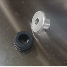 Gummibussning till topp-kåpa